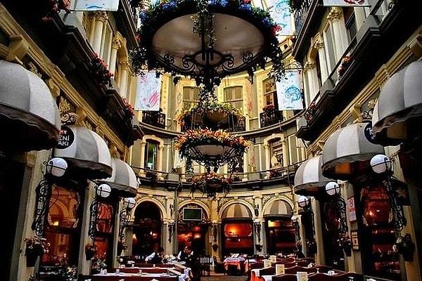 1. The historic Çiçek Passage with its tables lined up under the majestic dome