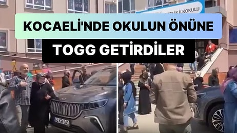 Kocaeli'nde AK Partililer Seçim Yapılan Okulun Önüne Togg Aracı Getirdi