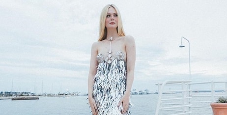 Серебряное платье Эль Фаннинг на Каннском фестивале, которое слегка прикрывает грудь, вызвало фурор