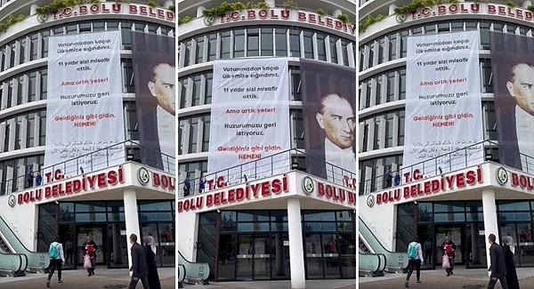 Astığı pankart AK Partililerin üzerine kaldırılan Tanju Özcan o anları sosyal medyada paylaştı.