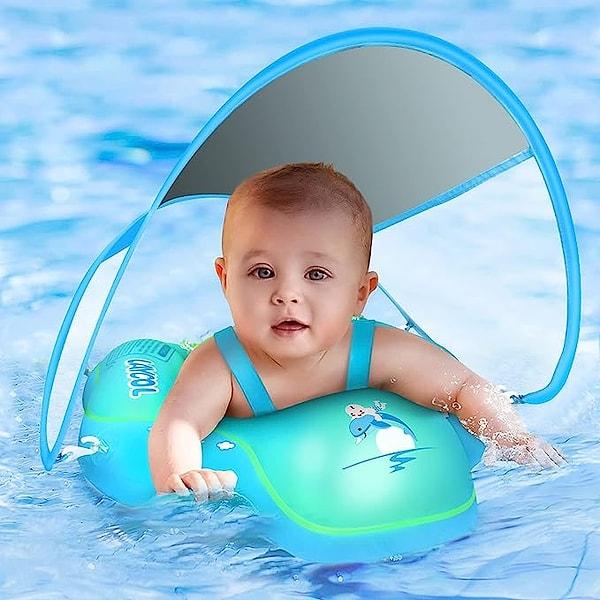 Minik bebekler denizde ya da havuzdayken başlarına güneş geçmesin diye güneşlikli yüzme simidi.