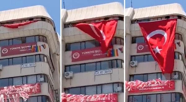 Duruma tepki göstermek isteyen bir grup, merkezin üst katına çıkarak camı dev Türk bayrağı ile kapattı.