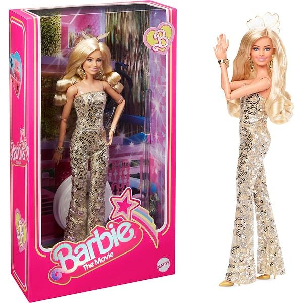 15. Barbie Movie - Barbie Gold Tulumlu Bebek.