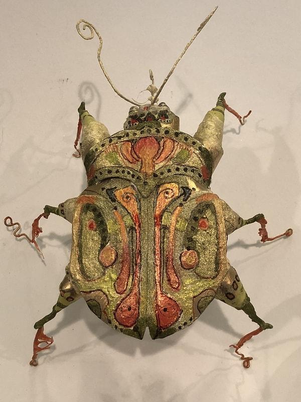 5. Resimdeki böcekler sanatçının korkularını temsil ediyor.