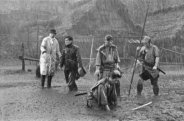 "The Seven Samurai" (1954) tells the story of a village that hires seven samurai to protect it from bandits.