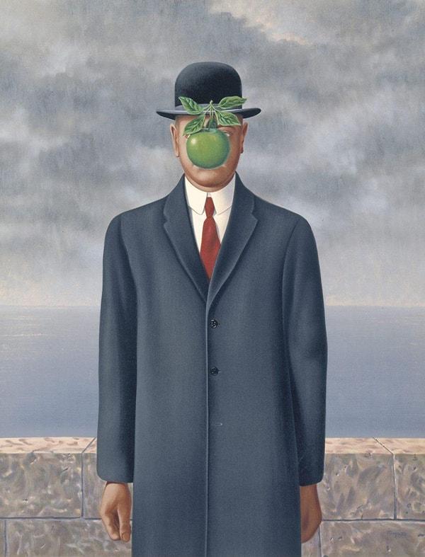 10. René Magritte'nin ünlü 'İnsanın Oğlu' tablosunda yeşil elmanın arkasına saklanan iyi giyimli adamın kim olduğunu hiç merak ettiniz mi? Bowler şapkasının altındaki gizemli adam, otoportrenin sürrealist versiyonuyla Belçikalı sanatçı.