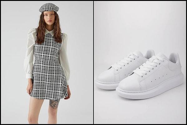 Gömlek detaylı ekose desenli elbise vintage esintiler barındırıyor! Elbiseyi beyaz sneaker ile kombinlemek çok trend görünmesini sağladı.