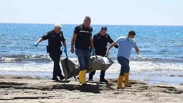 Aksi Kemerağzı Mahallesi'ndeki 5 yıldızlı otelin çalışanları tarafından saat 10.30 sıralarında sahilde ceset görüldü.