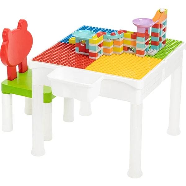 7. Bir masa ve sandalyeden çok daha fazlası. 3'ü 1 arada set ile çocuğunuz hem resim çizebilir hem lego oynayabilir hem de kinetik kum havuzuna kavuşabilir.