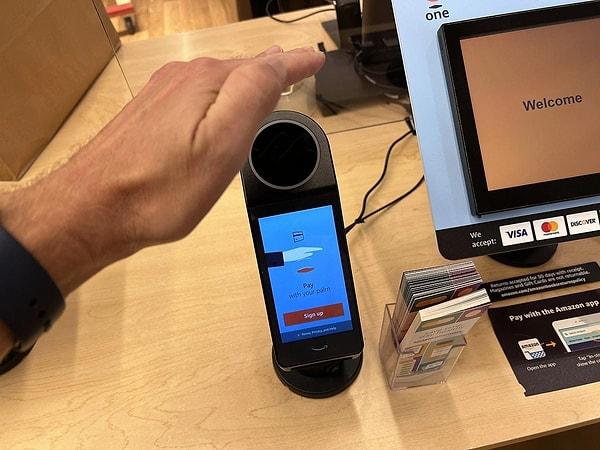 The new Amazon One app allows customers to log into their Amazon accounts, take a photo of their palms, and add a payment method to create their online profiles.