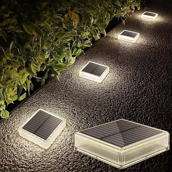 2. Bahçe ya da terasınızda kullanabileceğiniz suya dayanıklı, güneş enerjili zemin lambaları.