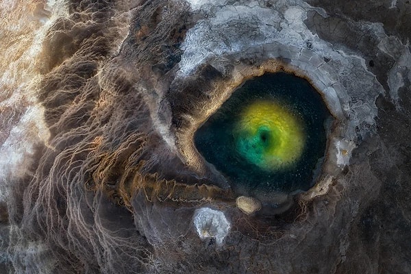 This lake photo resembling an eye of a dragon will also compete in the best nature photos category.