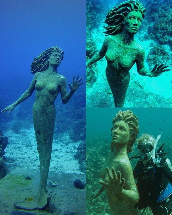 3. Grand Cayman adasının Güneybatı ucunda yer alan Amphitrite (Deniz Kızı Heykeli)