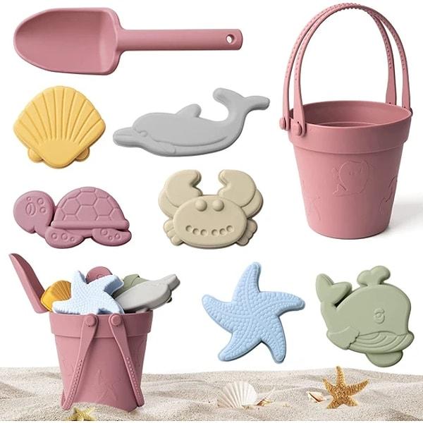 2. Valize kolaylıkla sığan çocukların da ebeveynlerinin de bayıldığı silikon plaj oyuncak seti.