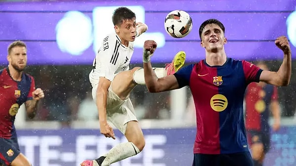 Nico Paz, 82'nci dakikada Real Madrid'e gol kazandırsa da çabalar yetmedi ve dostluk maçını kazanan takım Barça oldu.