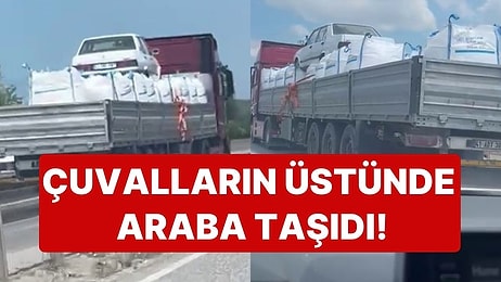 Trafikte Tehlikeli Yolculuk: TIR Dorsesine Yüklediği Çuvalların Üzerinde Araba Taşıdı