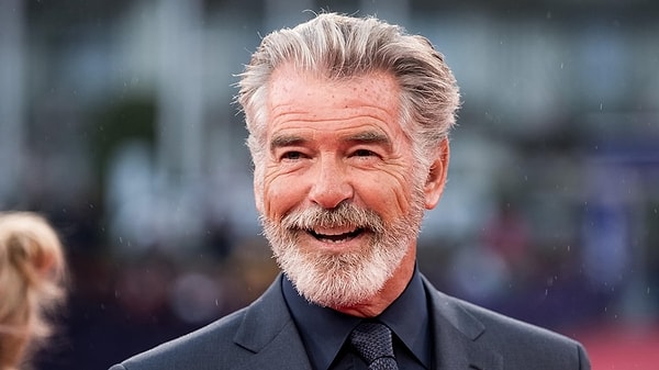 Pierce Brosnan, the 71-year-old actor forever etched in our memories as James Bond, will play Harry's boss, 'Conrad Harrigan.'