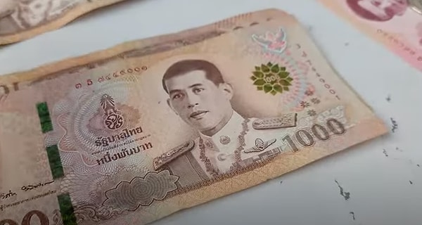 Did you know that stepping on money is "illegal" in Thailand?