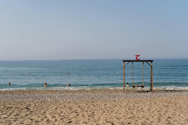 5. Side Beaches: Where Golden Sand and Turquoise Sea Meet