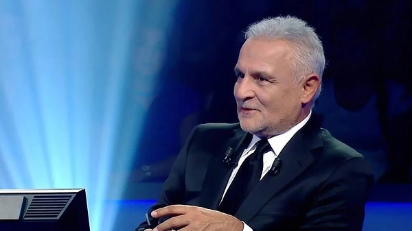 Kenan Işık ekranlardan bize sesleniyordu.