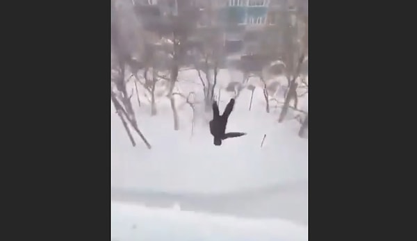 A man took a leap from his house window into the snow.