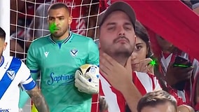 Busted! Cameraman Catches Fan Trying to Blind Opponent Goalie with a Laser During the Match