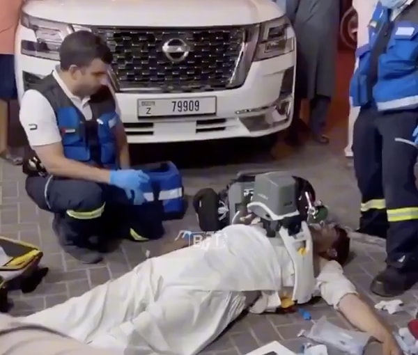 What exactly is the device performing chest compressions in the video?
