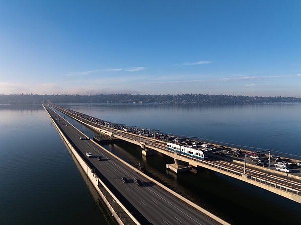 Trains are transporting passengers over a floating bridge for the very first time.