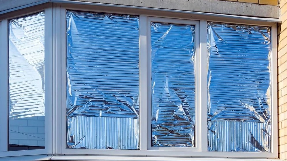 Why Are Europeans Covering Their Windows with Aluminum Foil?