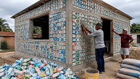 He Used Milk Cartons Like Bricks to Build a House Instead of Throwing Them Away