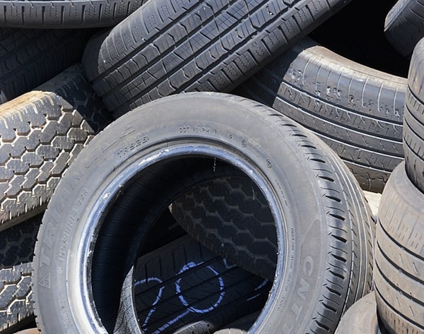 The tread stripes show that the tire is new.
